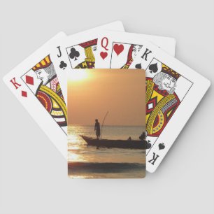 Vissende boot op zonsondergang pokerkaarten