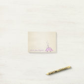 Vlamvogels in liefde en roodheid post-it® notes (Op bureau)