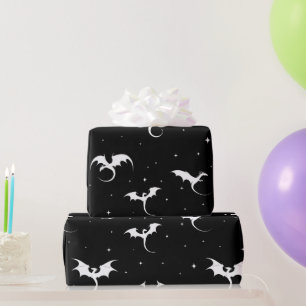 Vliegende draken en sterren op zwarte achtergrond cadeaupapier