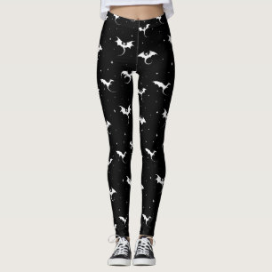 Vliegende draken en sterren op zwarte achtergrond leggings