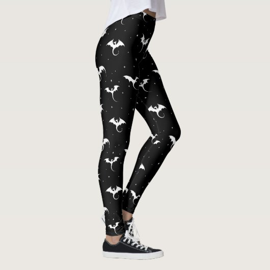 Vliegende draken en sterren op zwarte achtergrond leggings (Rechts)