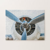 Vliegtuig-engine en blauwe propeller legpuzzel (Horizontaal)