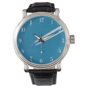 Vliegtuig tegen een blauwe achtergrond aan de luch horloge