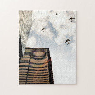 Vliegtuigen boven gebouwen legpuzzel