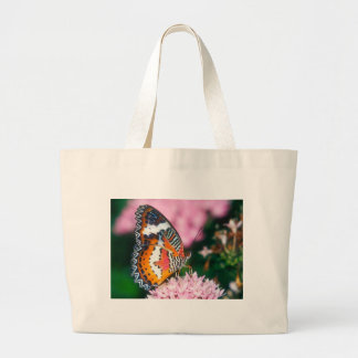 vlinder rode lacterende vlinder grote tote bag