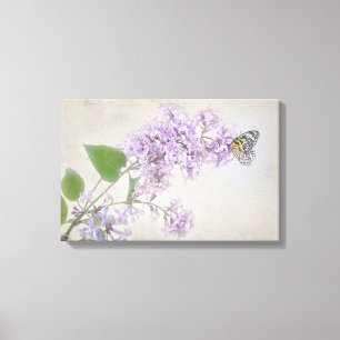 vlinder voor lila bloesem canvas afdruk