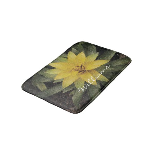 Vloeibaar slipbad met gele bloem badmat (Gekanteld)