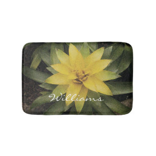 Vloeibaar slipbad met  gele bloem badmat