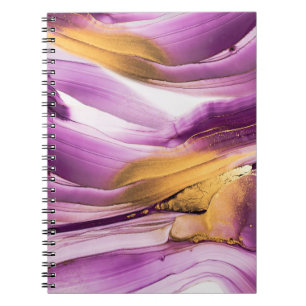 Vloeibare kunst, lila gouden gemarmerde textuur. notitieboek