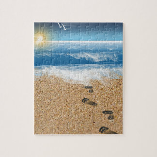 Voetafdrukken in de zand legpuzzel