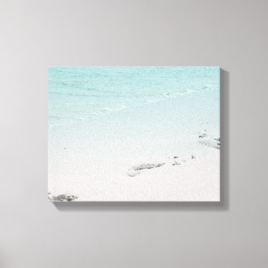 Voetafdrukken in het Zand met Oceaan op het strand Canvas Afdruk (Voorkant)