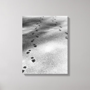 Voetafdrukken in sneeuw canvas afdruk