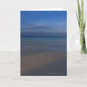 Voetafdrukken op het strand kaart