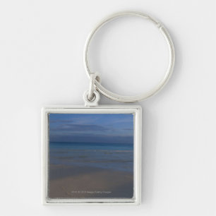 Voetafdrukken op het strand sleutelhanger