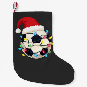 Voetbal gewikkeld in Kerstverlichting Voetbalspele Kleine Kerstsok