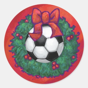 Voetbal in een kerstmis op rood ronde sticker