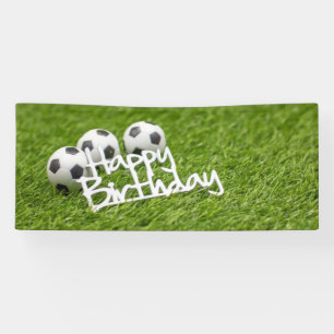 Voetbal met Happy Birthday-woord op groen Spandoek