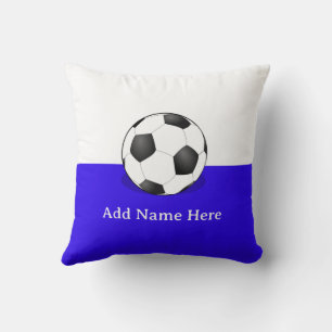 Voetbal op witte en blauwe achtergrond kussen