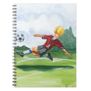 Voetbalspeler die een bal trapt door Jay Throckmor Notitieboek