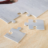 Voetbalspeler en voetbal in de lucht legpuzzel (Zijkant)