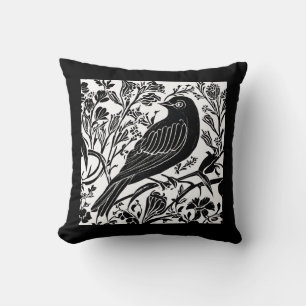Vogel op een tak met bloemen in zwart en wit kussen