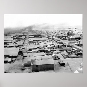 Vogeloog uitzicht van Nome, Alaska met sneeuw Poster