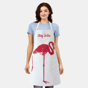 vogels, een roze flamingo met één been omhoog schort