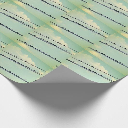 Vogels op draden, blauwe lucht. cadeaupapier (Hoek)