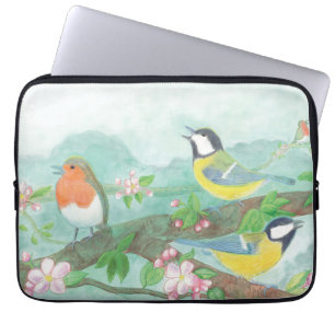 Vogels zingen op een bloeiende boomtak laptop sleeve