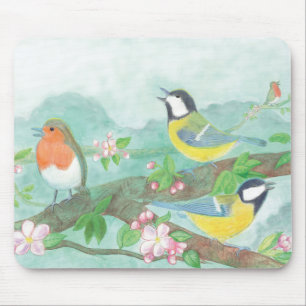 Vogels zingen op een bloeiende boomtak muismat