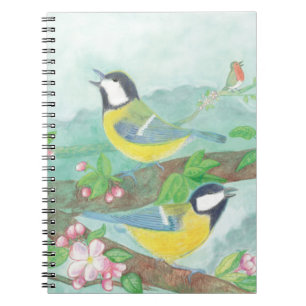 Vogels zingen op een bloeiende boomtak notitieboek