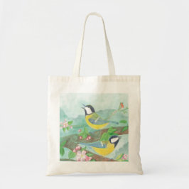 Vogels zingen op een bloeiende boomtak tote bag