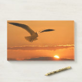 Vogelvliegen op zonsondergang post-it® notes (Op bureau)