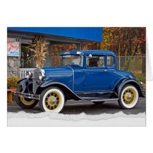 Voiture antique par Diner avec Bichon Frise Dog