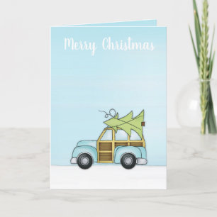 Voiture avec la carte de Noël Arbre