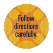 Volg de aanwijzingen zorgvuldig op Oranje plekken Snijplank (Voorkant)