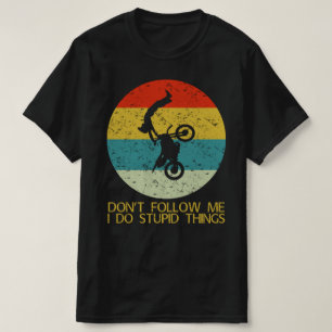 volg me niet als ik domme dingen doe t-shirt