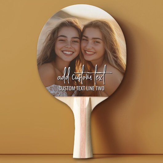 Volledige foto met tekst van 2 regels - script en  tafeltennisbatje