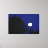 Volledige maan met bomen en blauwe hemel canvas afdruk (Voorkant)