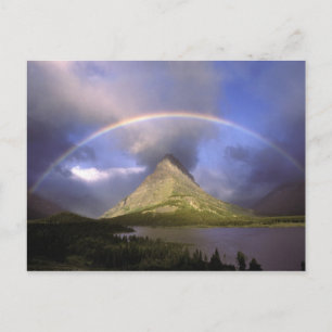 Volledige regenboog en stormachtige lucht boven Gr Briefkaart