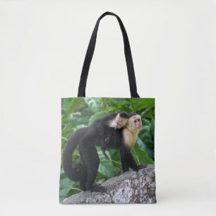 Volwassen capuchin-aap die Baby op de rug draagt Tote Bag