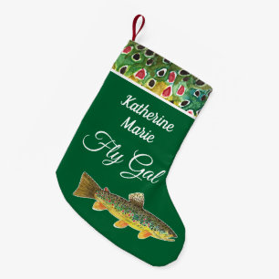 Voor haar bruine forel vliegen kleine kerstsok