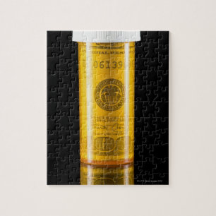 Voorgeschreven fles met 100 dollar biljet legpuzzel