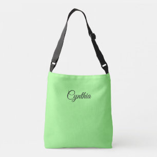 Voorjaar groen en zwart in elegantie: crossbody tas