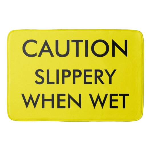 Voorzichtig. Slipperig wanneer nat. Badmat (Voorkant)