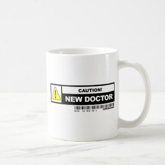 Voorzichtigheid nieuwe arts koffiemok
