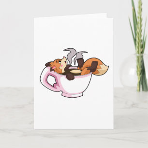Vos met koffiekopje kaart