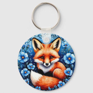 Vos omringd door blauwe bloemen sleutelhanger