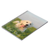 Votre chiot mignon sur un carnet de notes à (Côté gauche)