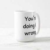 Vous le faites droit. Vous le faites faux. Tasse (Devant droit)